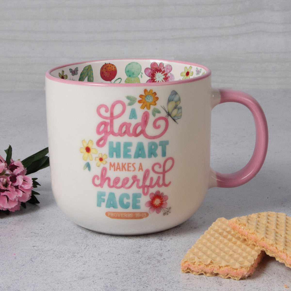 A Glad Heart Makes a Cheerful Face Ceramic Mug